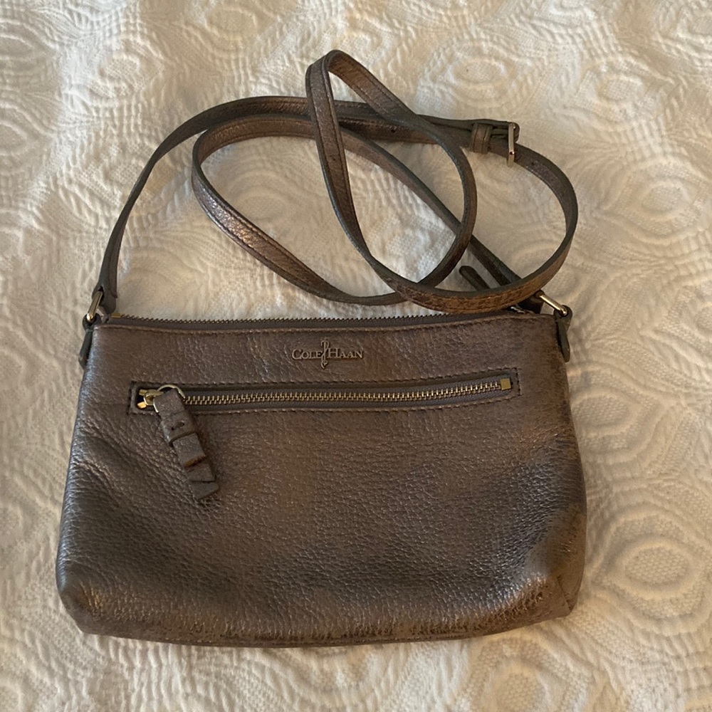 Mini Cole Haan crossbody bag.